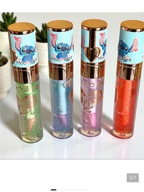 Disney Stitch 4pc Glitter Lip Gloss Set lightly scented high gloss brand new